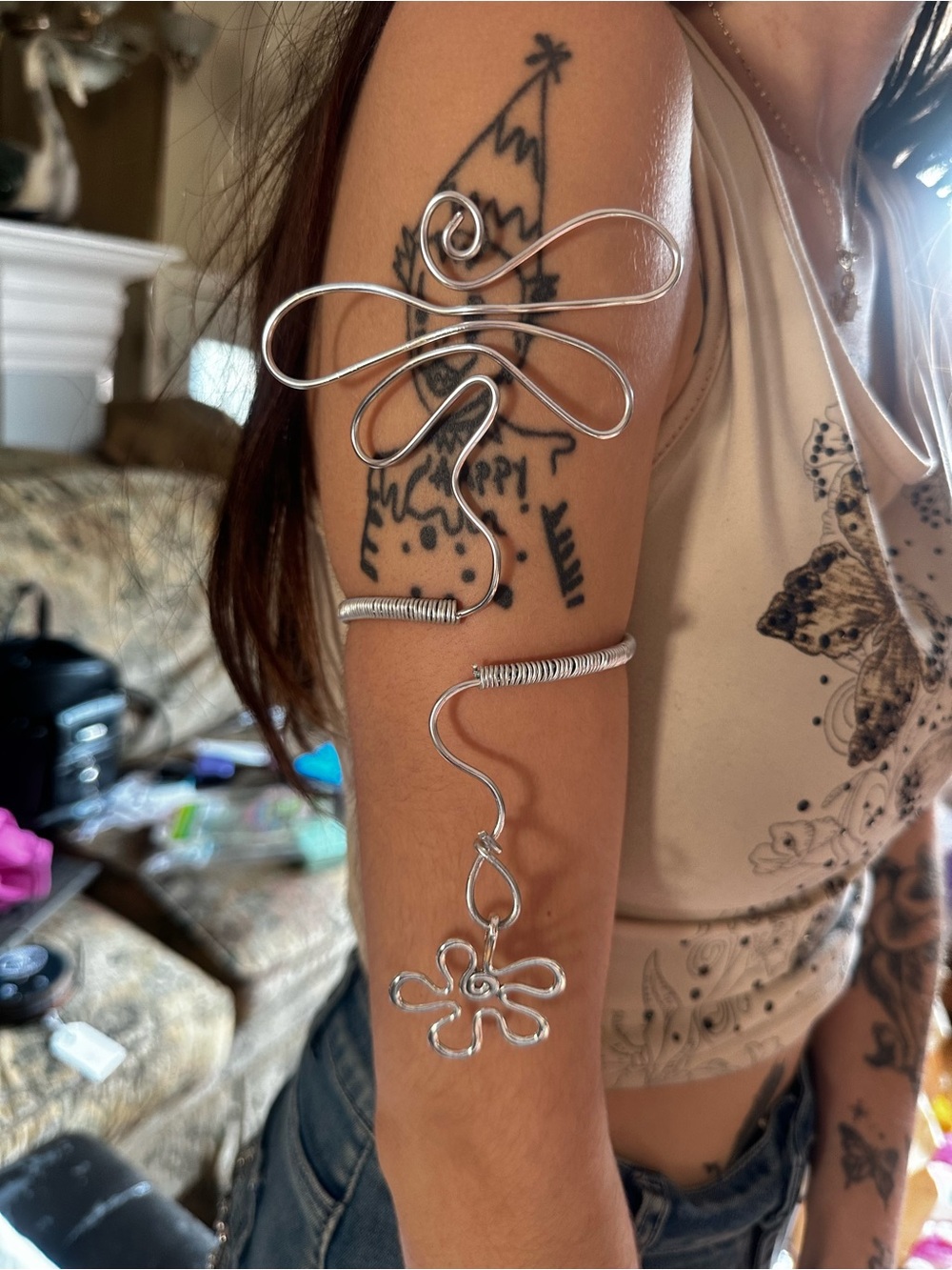 Handcrafted Silver-Tone Wire Arm Cuff with Flower Charm